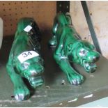 A pair of green glazed panthers