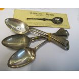 Some silver spoons and silver Anointing spoon