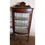 An Edwardian display cabinet on square legs with painted decoration