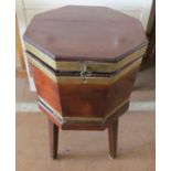 A 19th Century octagonal mahogany wine cooler on stand