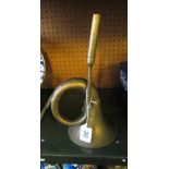 A brass car horn