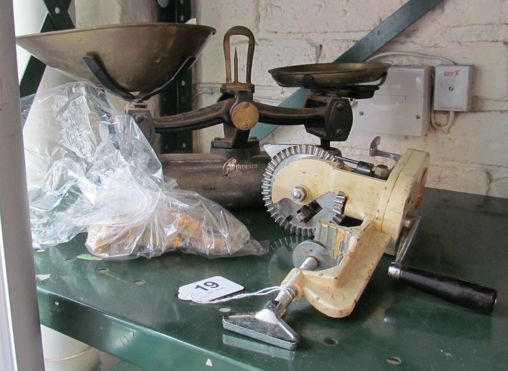 A set of brass scales and weights and a vintage mirror