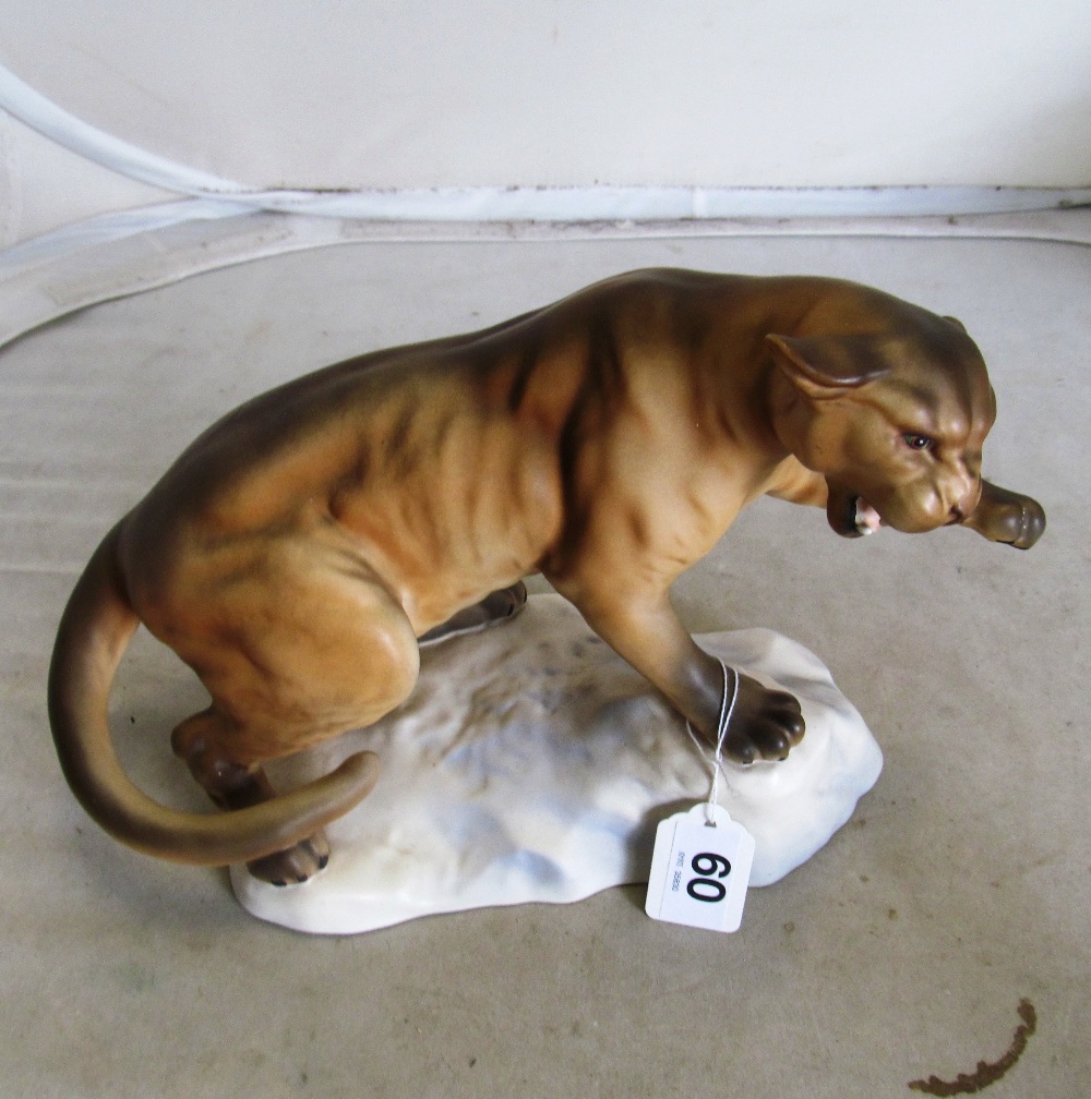 A Beswick panther on rocky base