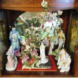 A geisha ornament with flowering tree and other geisha ornaments