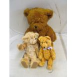 An Aston Drake teddy bear made to look like a well loved vintage bear, a Vintage gold plush bear and