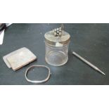 A rolled (silver) pencil, cigarette case, lidded pot and bangle
