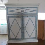 A white cabinet with blue highlights