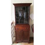 A 19th Century mahogany narrow secretaire bookcase with single astragal glazed door, above fitted