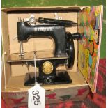 A Singer 20 sewing machine, Muffin the Mule and other toys