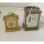 A carriage clock and a small alarm clock