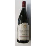 A bottle Vosne Romanee 1er Cru les Suihots 1997