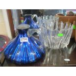 A signed glass vase and blue jug