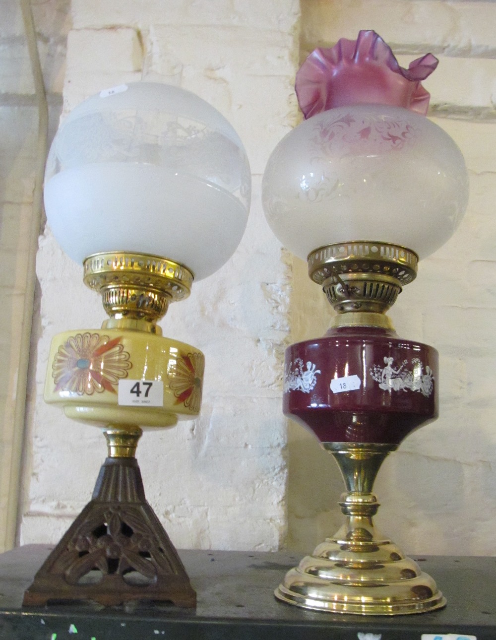 Two small oil lamps