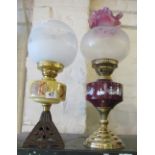 Two small oil lamps