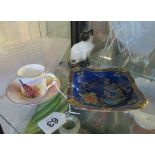 A Beswick cat, Paragon dish and Royal Worcester cup and saucer