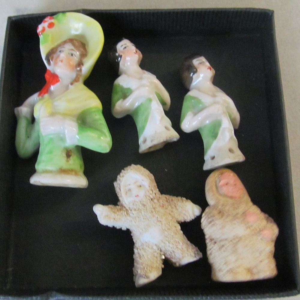 A pair of Victorian figures boy and girl holding spoons, three small crinoline ladies, two snow - Image 2 of 3