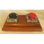 An inkstand bakelite lids