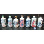 Seven oriental imari coloured scent bottles (one without lid, one loose lid)