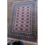 A Bokhara pink ground rug