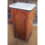 A marble top bedside cabinet and two other bedside cabinets