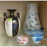 A blue and white sauce boat (handle repaired), lidded pot and two Japanese vases