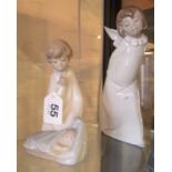 Two Lladro figures angels one with lantern behind back and the other with sleeping child