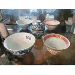 Four Chinese bowls and a blue and white bowl and cover