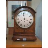 An oak and mahogany cased clock (no glass)