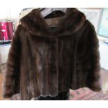 A fur coat and fur jacket