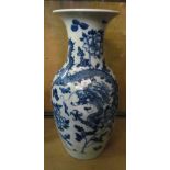 A large Chinese blue and white vase decorated dragon