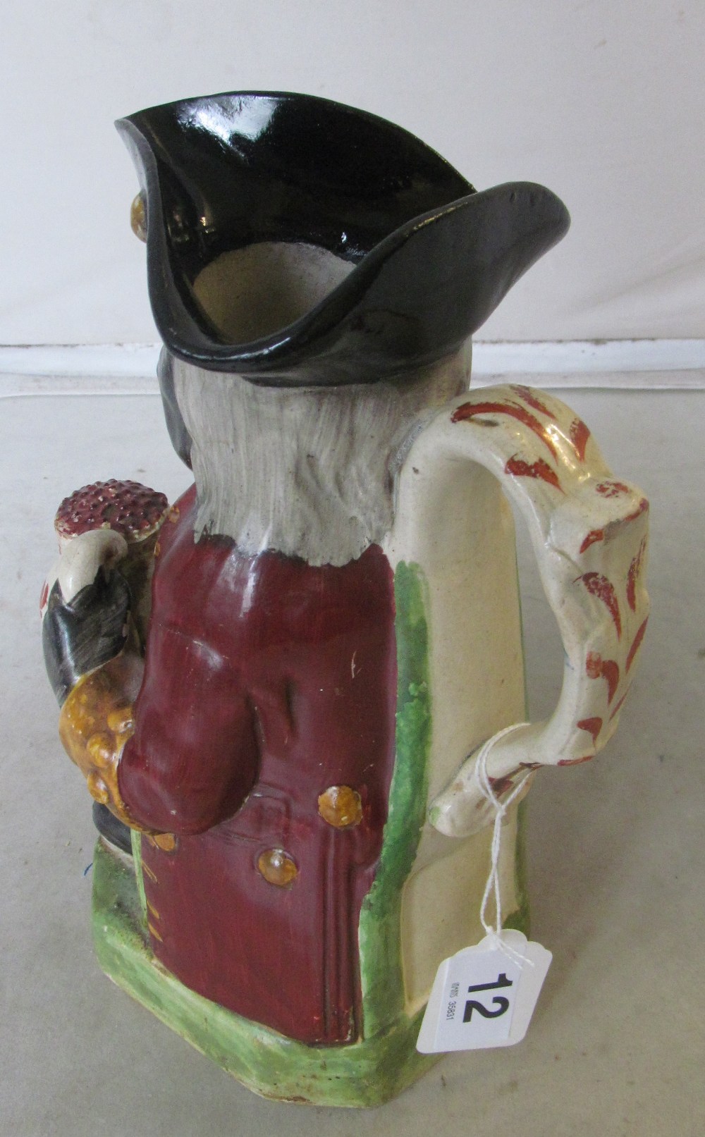 A 19th Century Pratt style 'Black man' toby jug (restored and missing hat lid) - Image 2 of 11