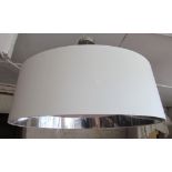 A large circular ceiling light/shade