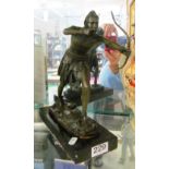 A bronze figure of an archer signed Milo