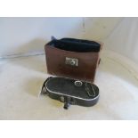 A Bell & Howell Film Camera 75 in leather case
