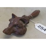 A Black Forest carved fox head nut cracker