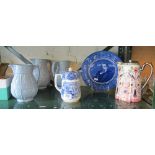 Three impressed moulded graduated blue jugs, a Royal Doulton Dickens plate, George Jones jug (slight