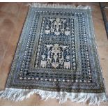Two prayer rugs and Bokhara rug