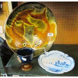 A fish pottery plate, Delft style plate and a galleon