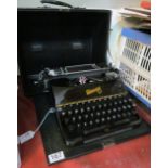 A Rheinmetall vintage typewriter in case