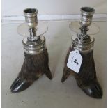 A pair of Wild Boar hooves made into candlesticks with plated sconces