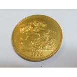 A gold Five Pound coin 1902