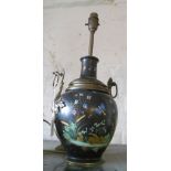 A black glazed vase decorated butterflies and flowers converted to a lamp (re-wired)