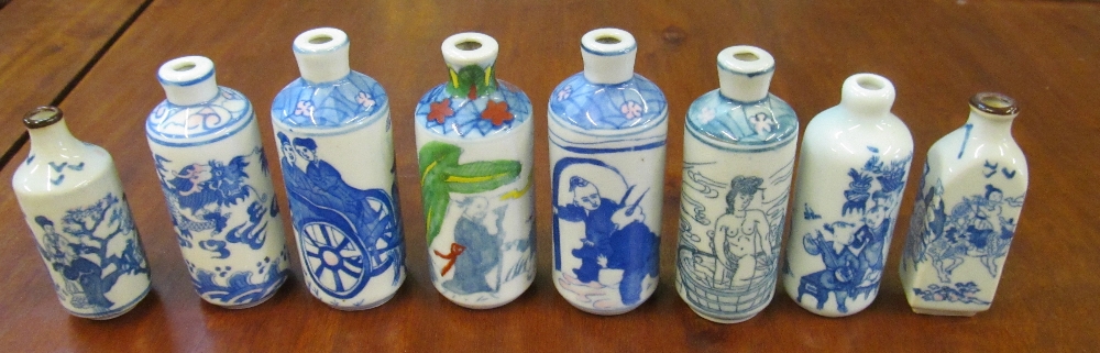 Eight oriental blue scent bottles