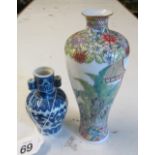 A Chinese vase decorated geisha and a blue and white oriental vase