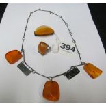 A small group of amber coloured jewellery