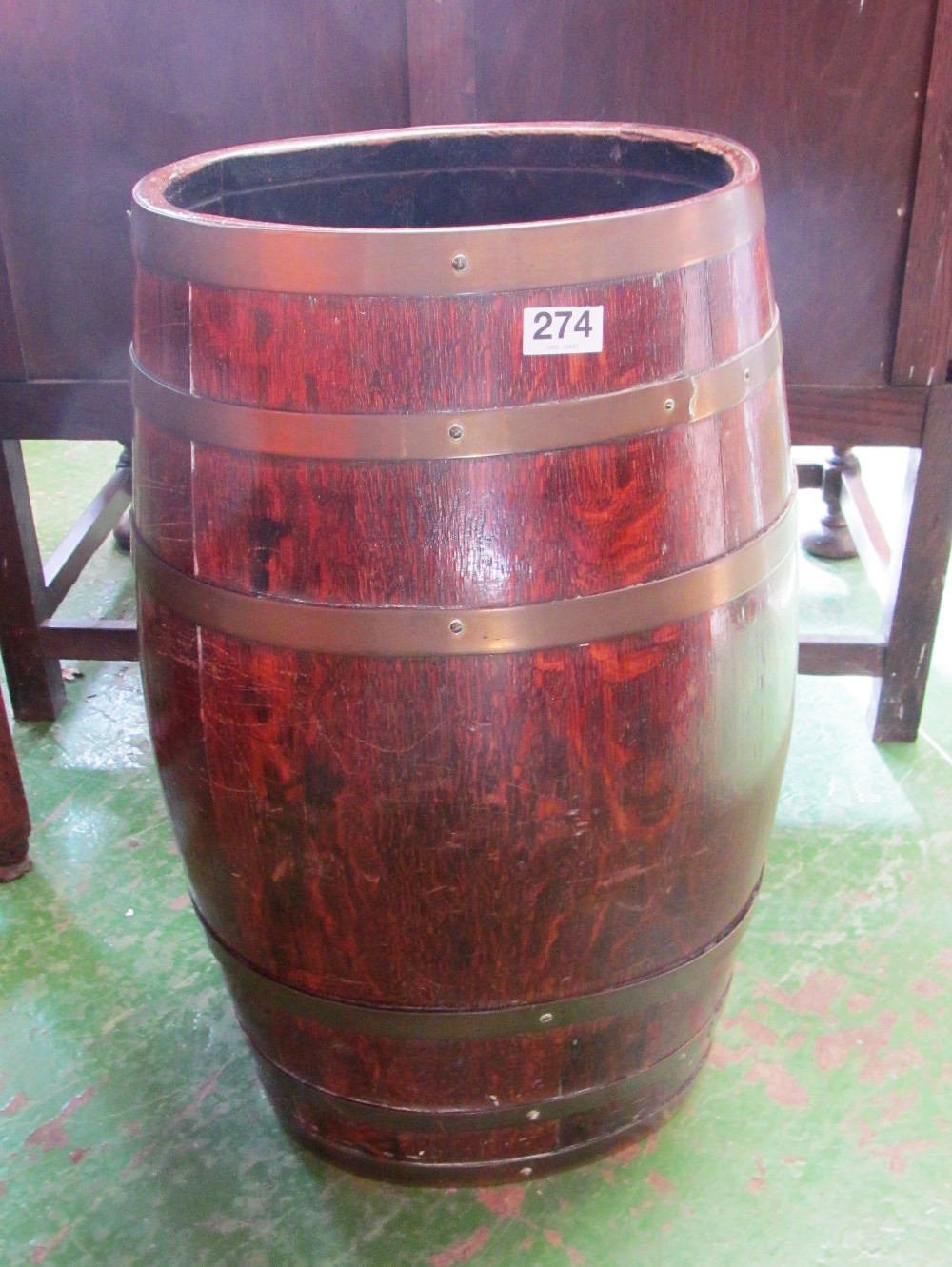 An oak barrel stick stand