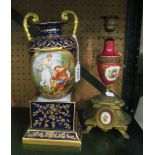 A gilt and porcelain candelabra and a blue and gilt vase on stand (restored)