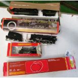 A Hornby two locos with tenders, tenders, track, loco and operating Tipper set, all boxed