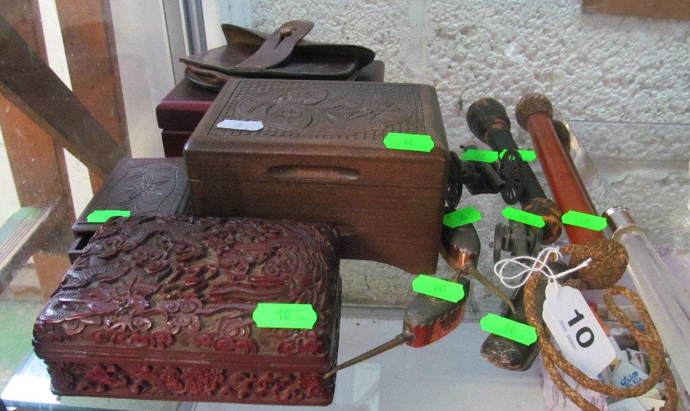 A red lacquer oriental box, other boxes, two miniatures cannons etc