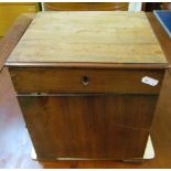 A 19th Century mahogany doctor's medicine cabinet rising lid and hinged door revealing bottle and